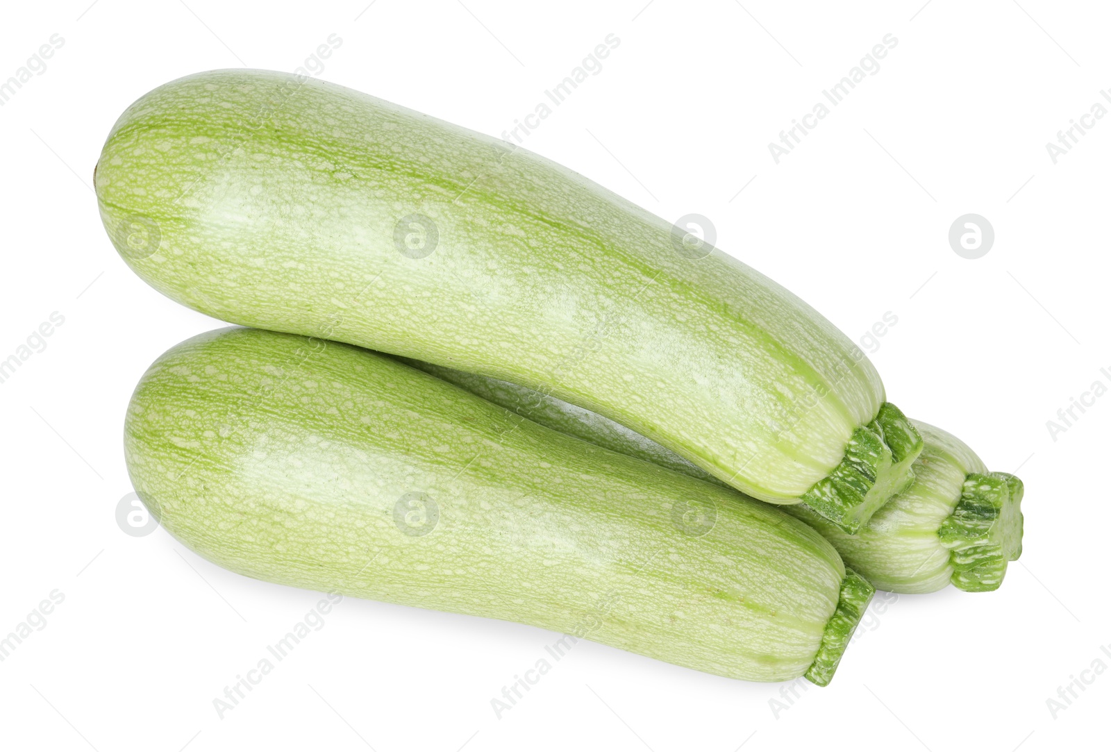 Photo of Many fresh ripe zucchinis isolated on white