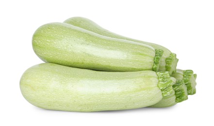 Photo of Many fresh ripe zucchinis isolated on white