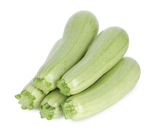 Photo of Many fresh ripe zucchinis isolated on white