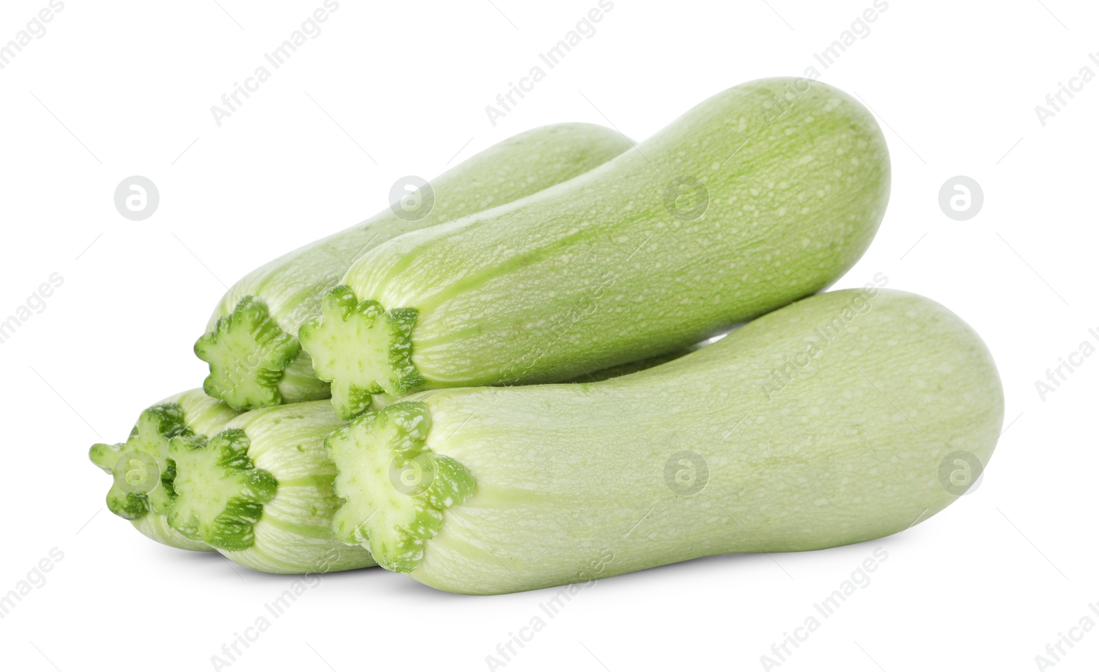 Photo of Many fresh ripe zucchinis isolated on white