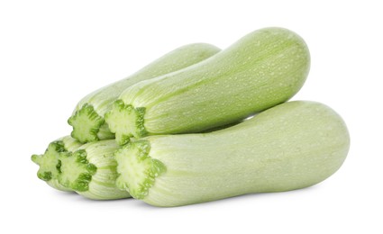 Photo of Many fresh ripe zucchinis isolated on white