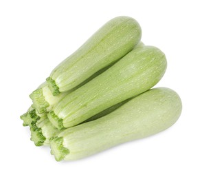 Photo of Many fresh ripe zucchinis isolated on white