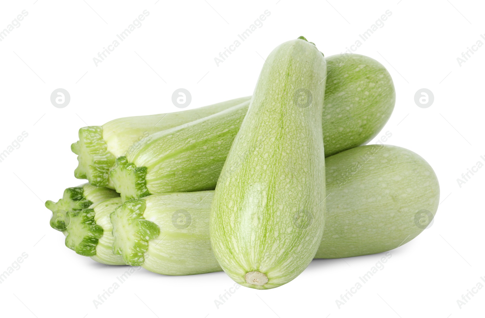 Photo of Many fresh ripe zucchinis isolated on white