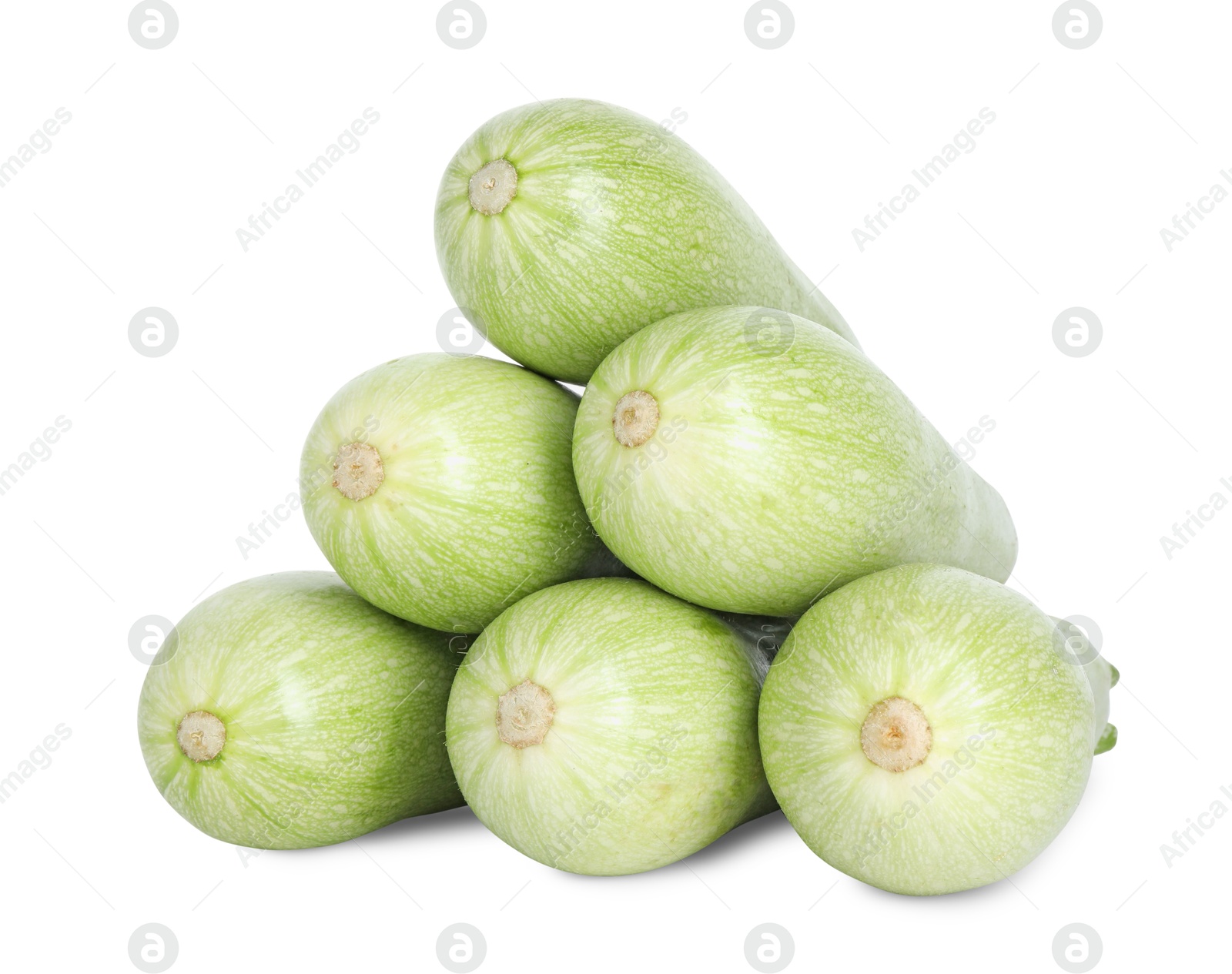 Photo of Many fresh ripe zucchinis isolated on white