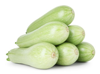 Photo of Many fresh ripe zucchinis isolated on white