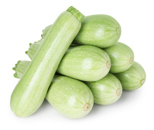 Photo of Many fresh ripe zucchinis isolated on white