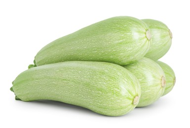 Photo of Many fresh ripe zucchinis isolated on white