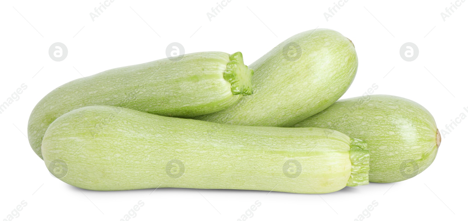 Photo of Many fresh ripe zucchinis isolated on white