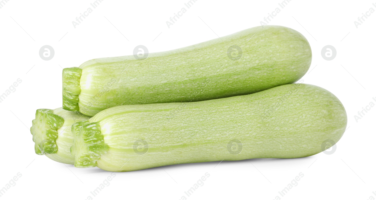 Photo of Many fresh ripe zucchinis isolated on white