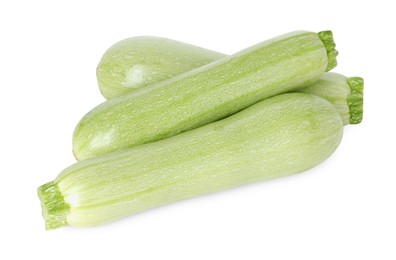 Photo of Many fresh ripe zucchinis isolated on white, above view