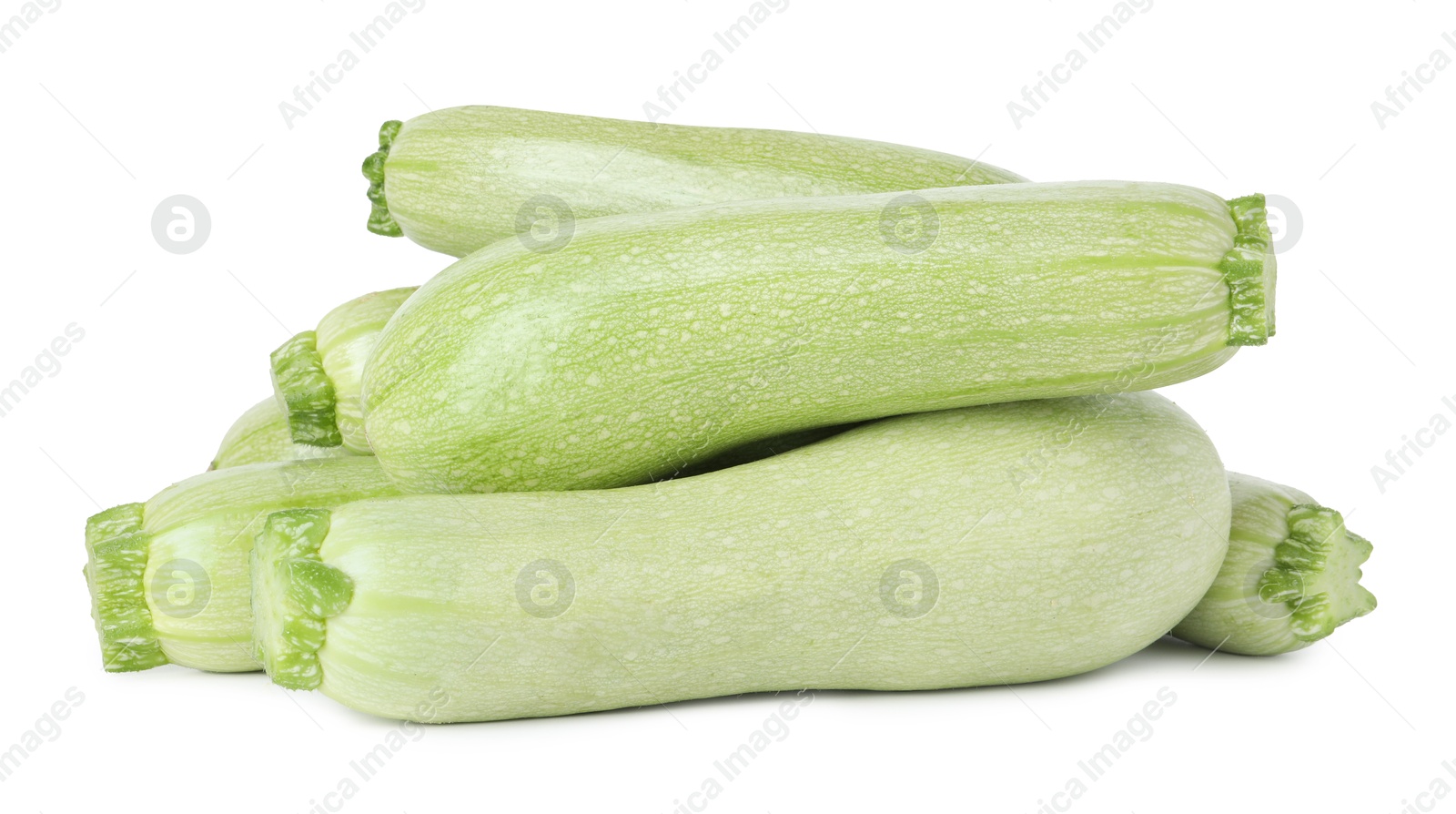 Photo of Many fresh ripe zucchinis isolated on white