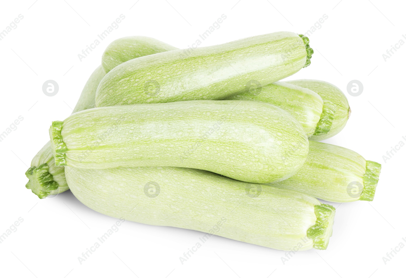 Photo of Many fresh ripe zucchinis isolated on white