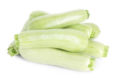 Photo of Many fresh ripe zucchinis isolated on white