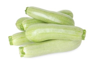 Photo of Many fresh ripe zucchinis isolated on white, above view