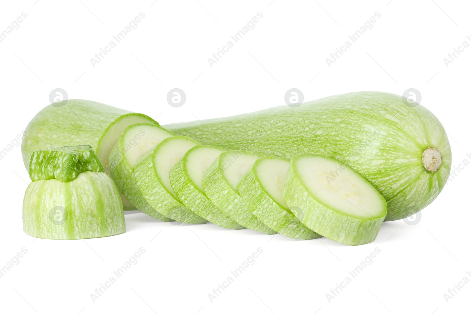 Photo of Fresh whole and cut zucchinis isolated on white