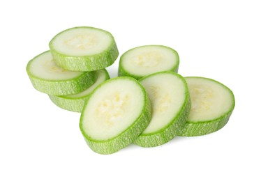 Photo of Pieces of fresh zucchini isolated on white