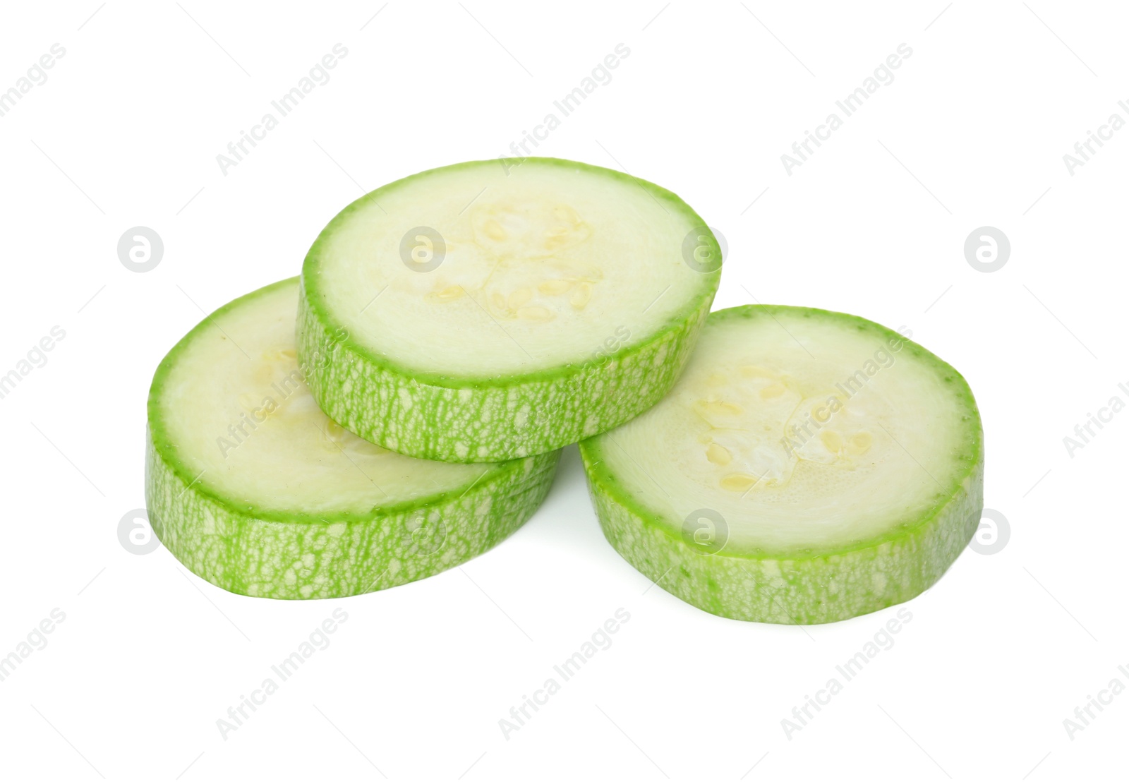 Photo of Pieces of fresh zucchini isolated on white