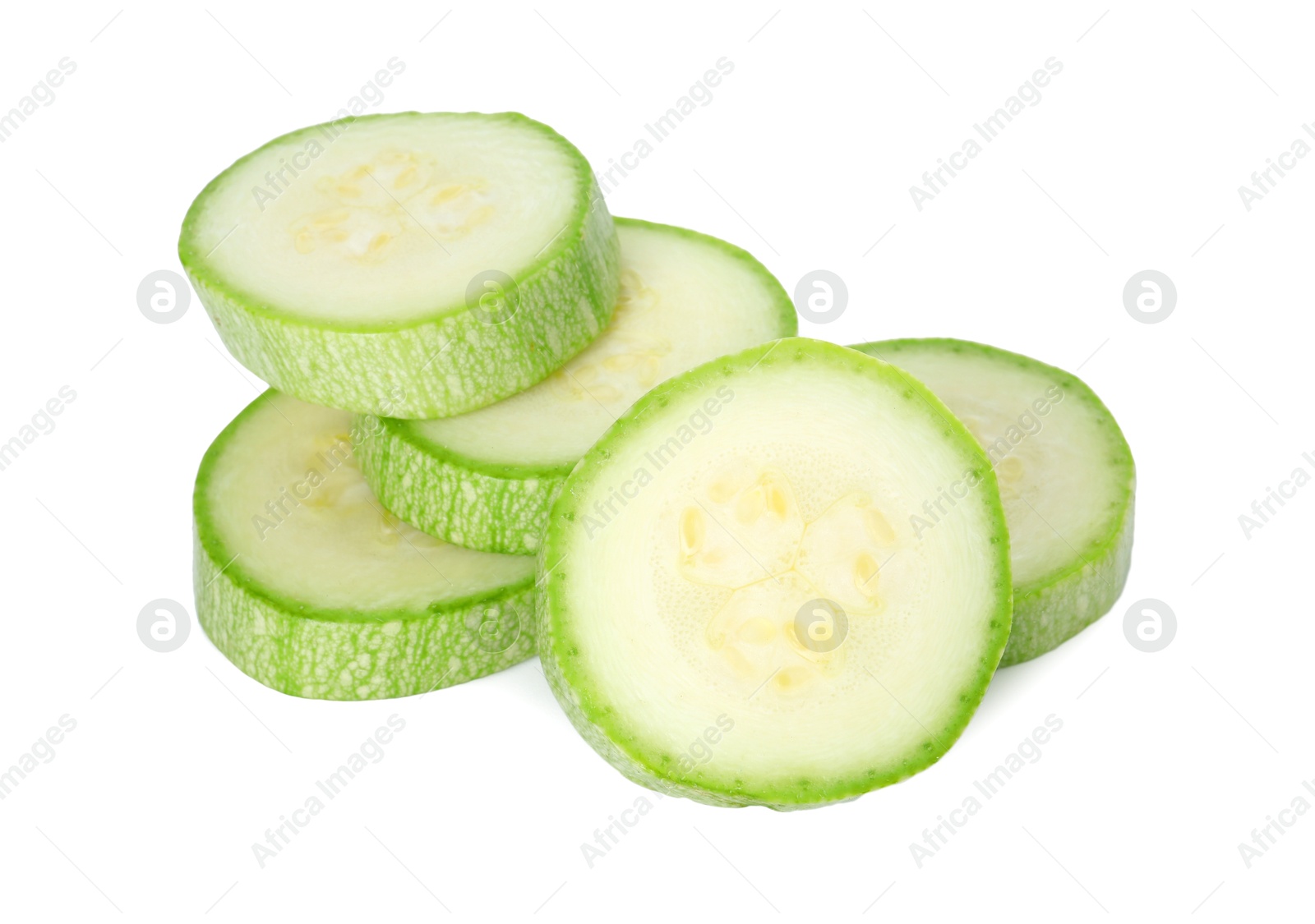 Photo of Pieces of fresh zucchini isolated on white