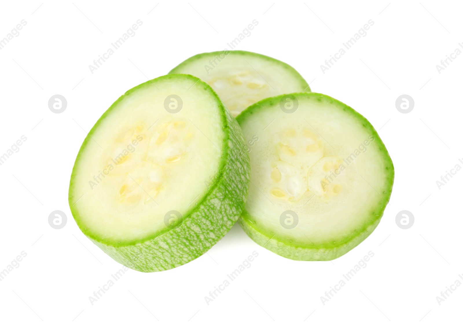 Photo of Pieces of fresh zucchini isolated on white