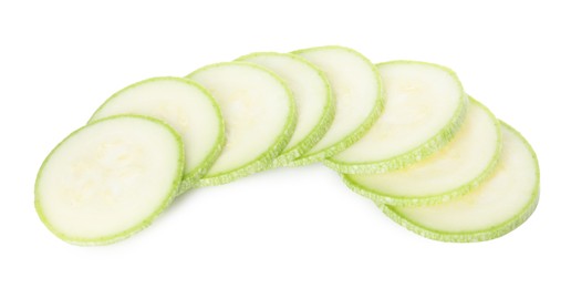 Photo of Pieces of fresh zucchini isolated on white