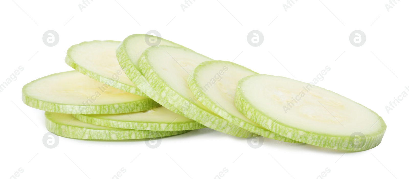 Photo of Pieces of fresh zucchini isolated on white