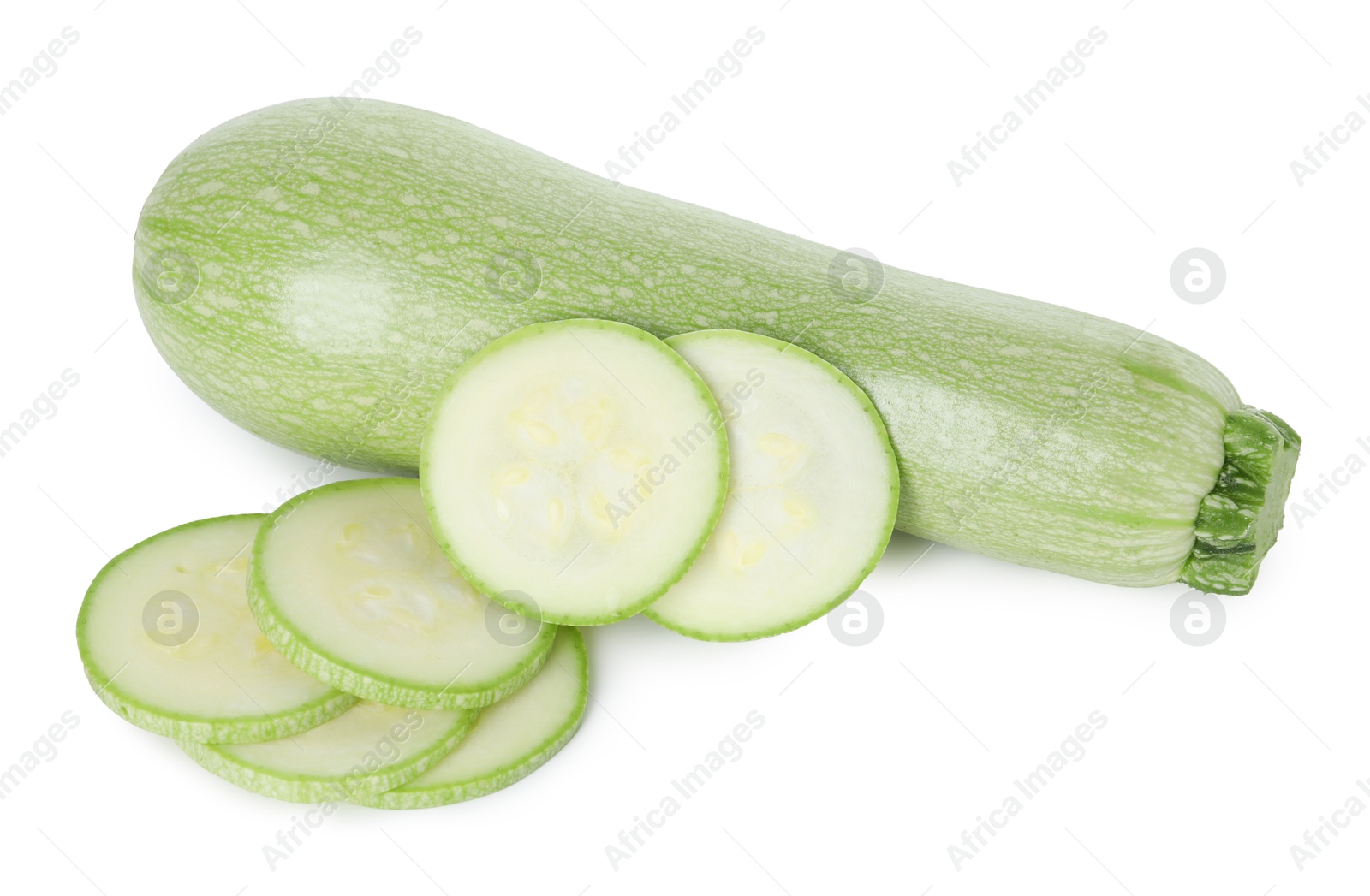 Photo of Fresh whole and cut zucchinis isolated on white, top view