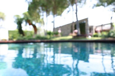 Photo of Blurred view of outdoor swimming pool at luxury resort