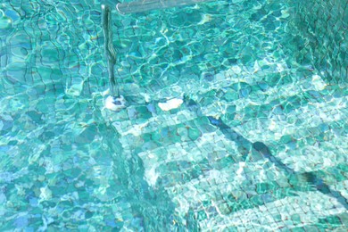 Photo of Clear water with ripples in outdoor swimming pool