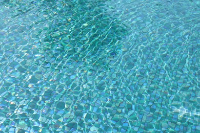 Clear water with ripples in outdoor swimming pool