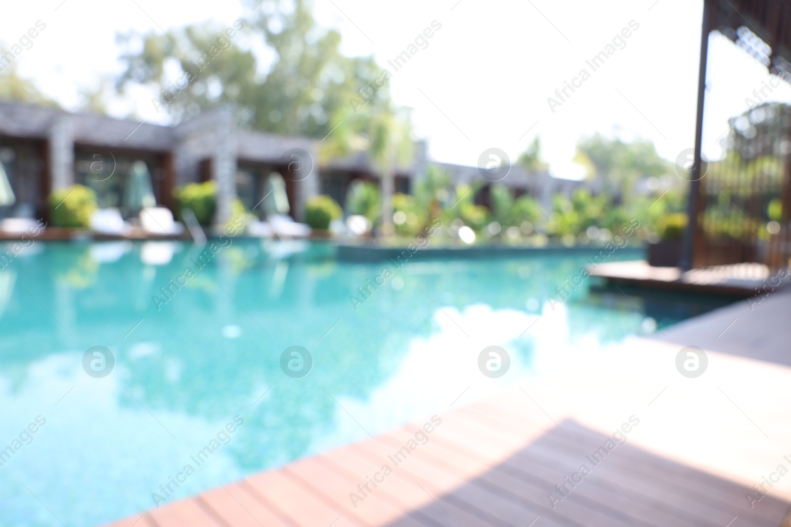 Photo of Blurred view of outdoor swimming pool at luxury resort