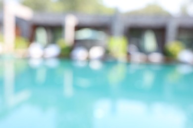 Photo of Blurred view of outdoor swimming pool at luxury resort