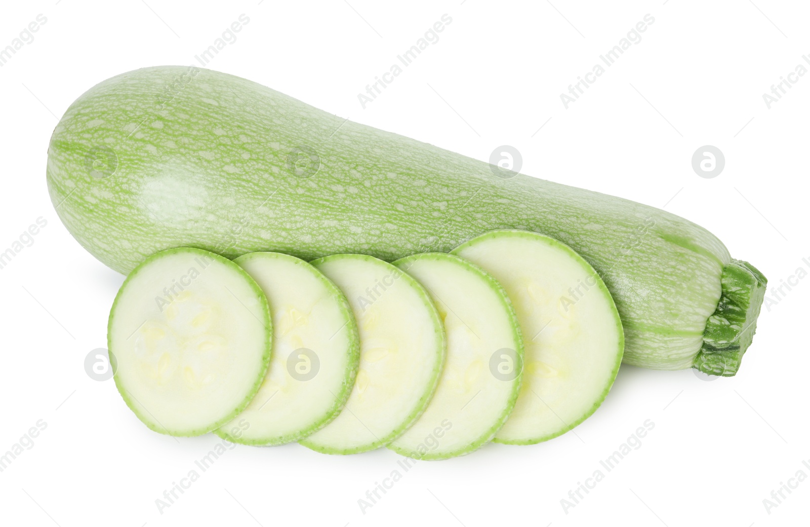 Photo of Fresh whole and cut zucchinis isolated on white, top view