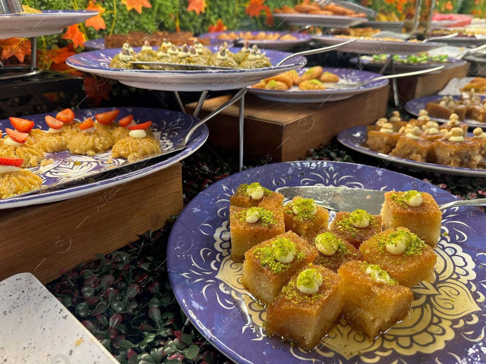 Photo of Different tasty desserts on table. Buffet service