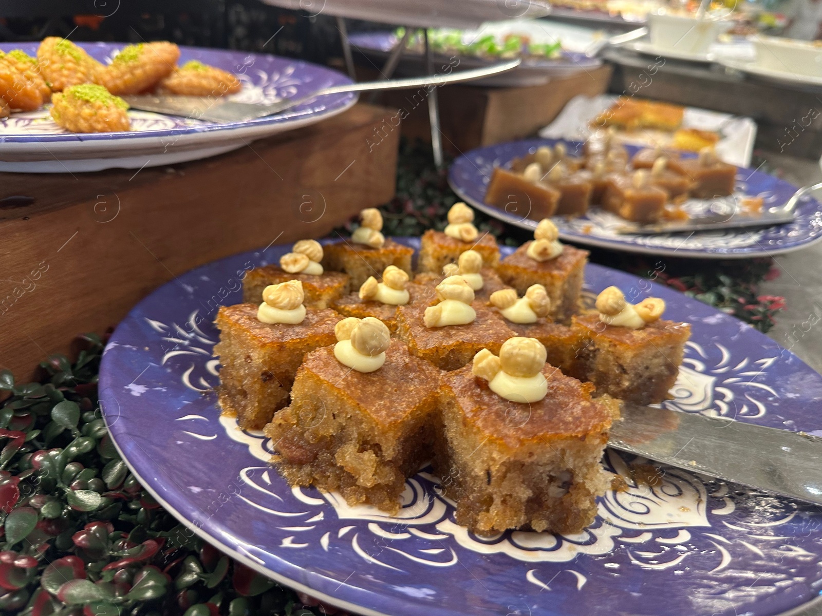 Photo of Different tasty desserts on table. Buffet service