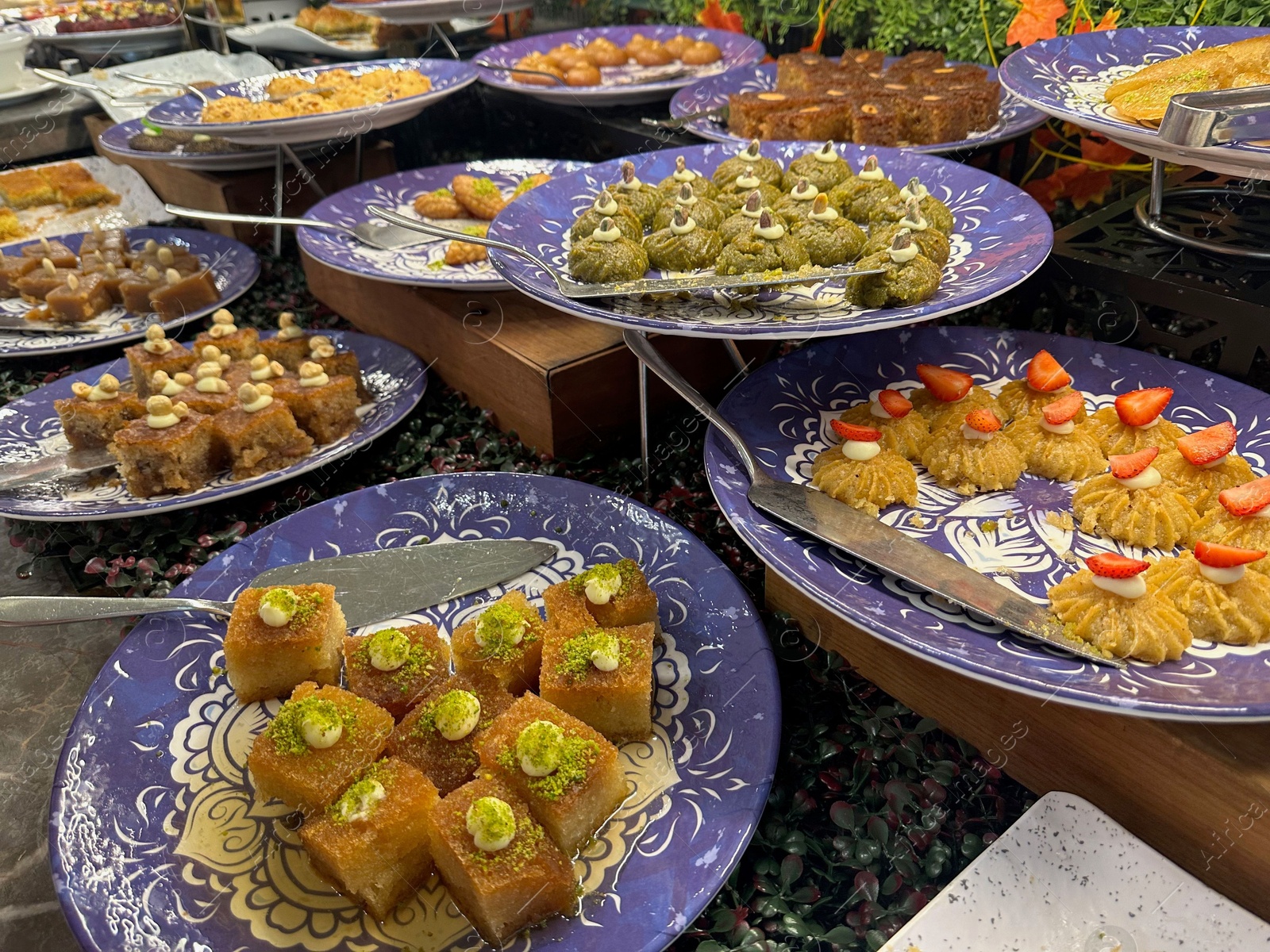 Photo of Different tasty desserts on table. Buffet service