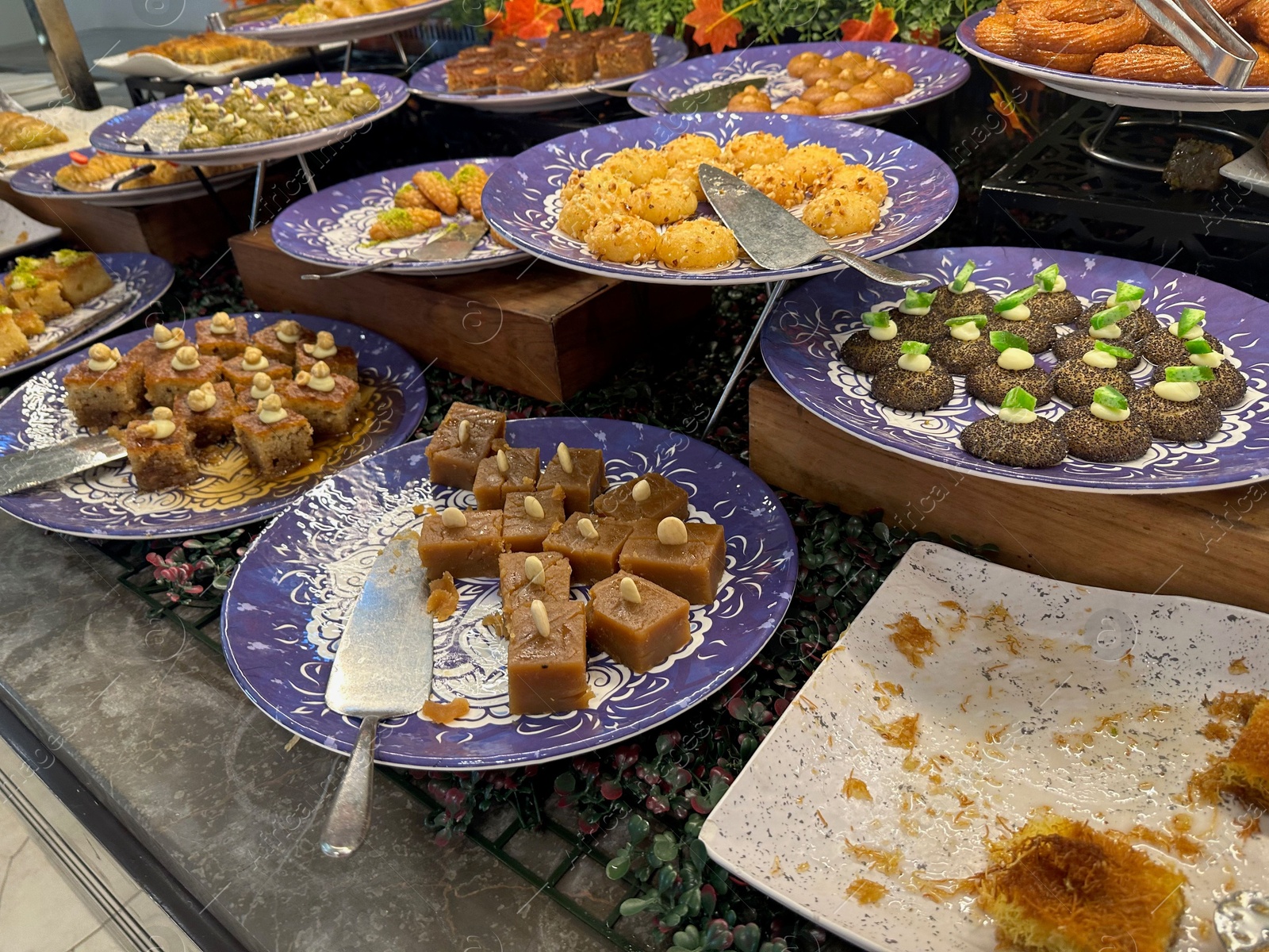 Photo of Different tasty desserts on table. Buffet service