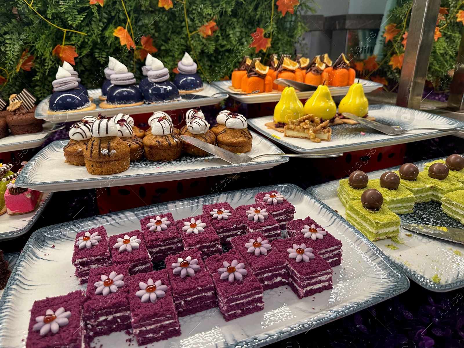 Photo of Different tasty desserts on table. Buffet service