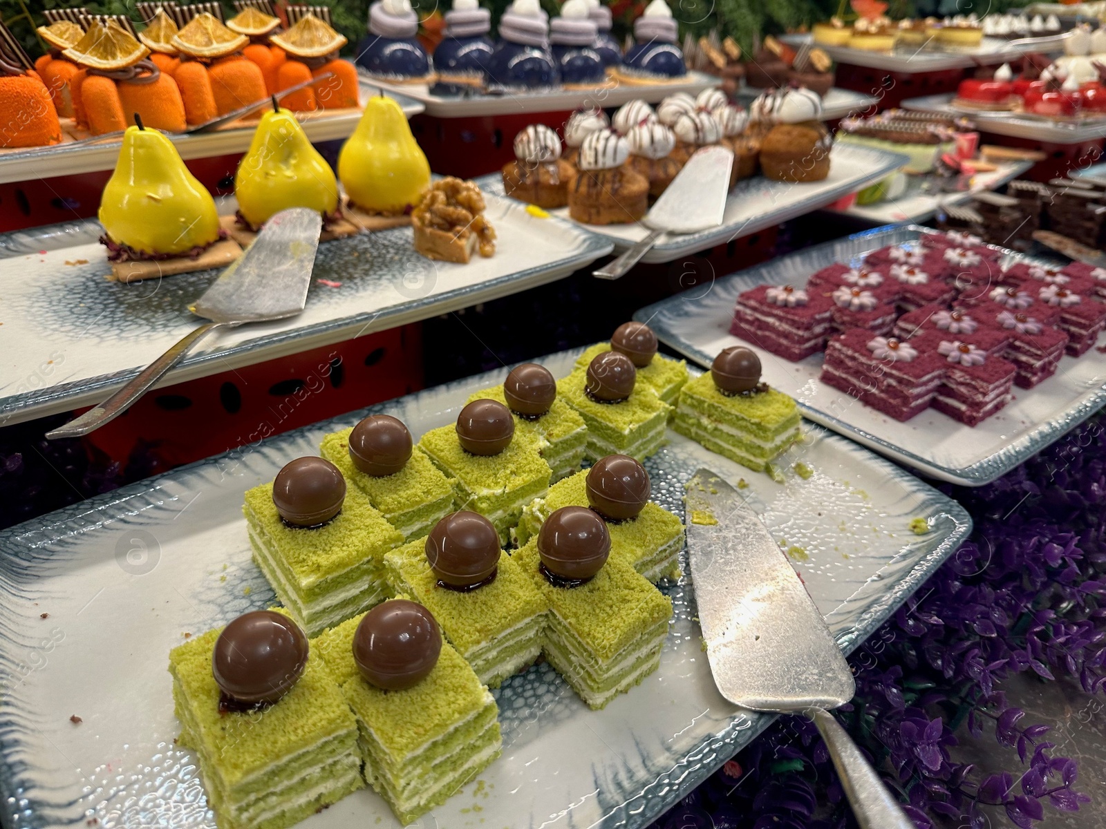 Photo of Different tasty desserts on table. Buffet service