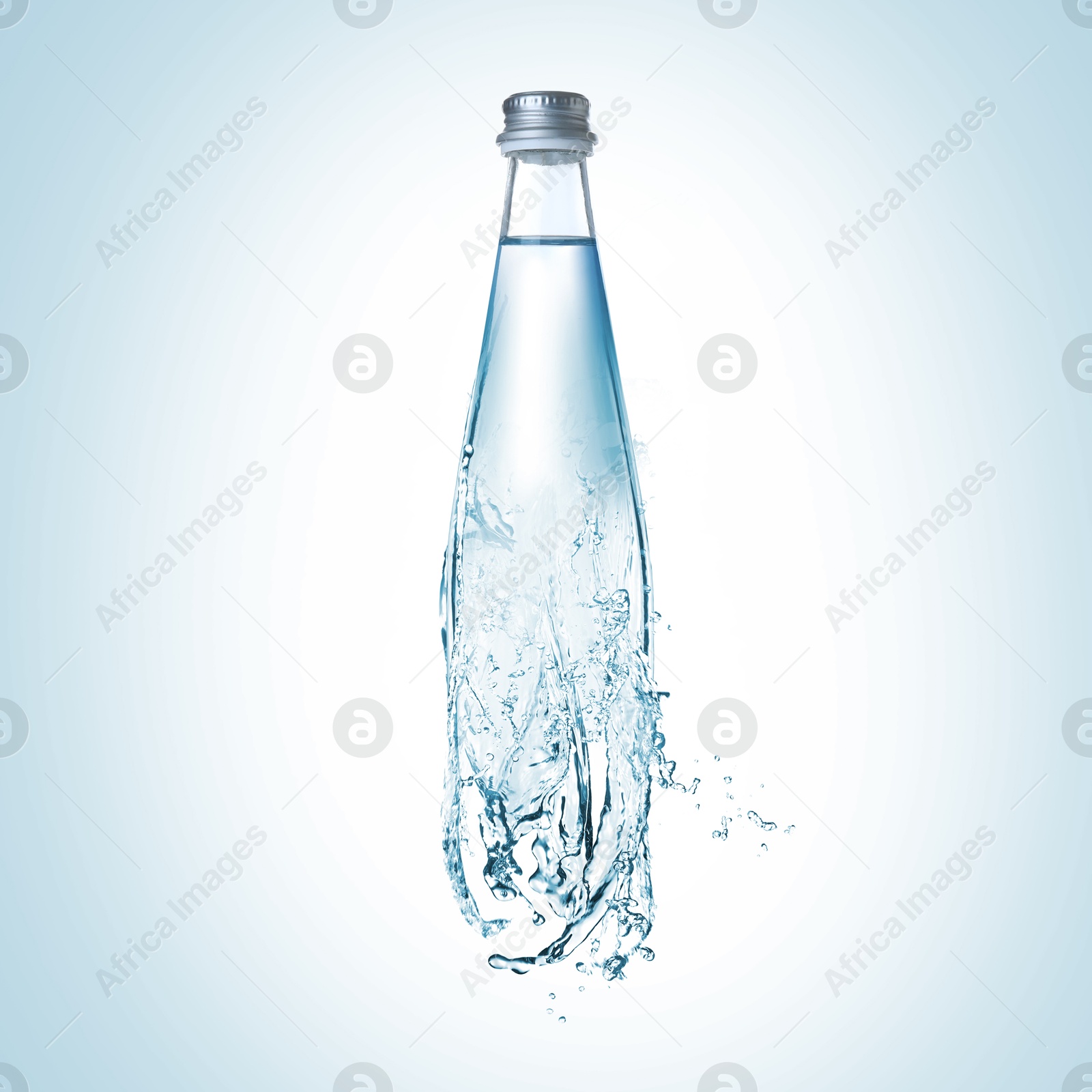 Image of Splashing water continuing shape of bottle on light blue background