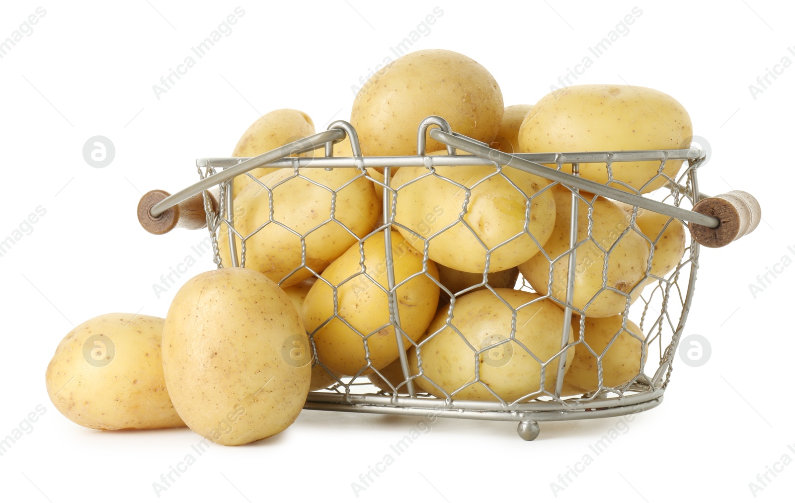 Photo of Young potatoes in metal basket isolated on white