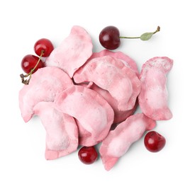 Photo of Frozen dumplings (varenyky) and fresh cherries isolated on white. Ukrainian cuisine