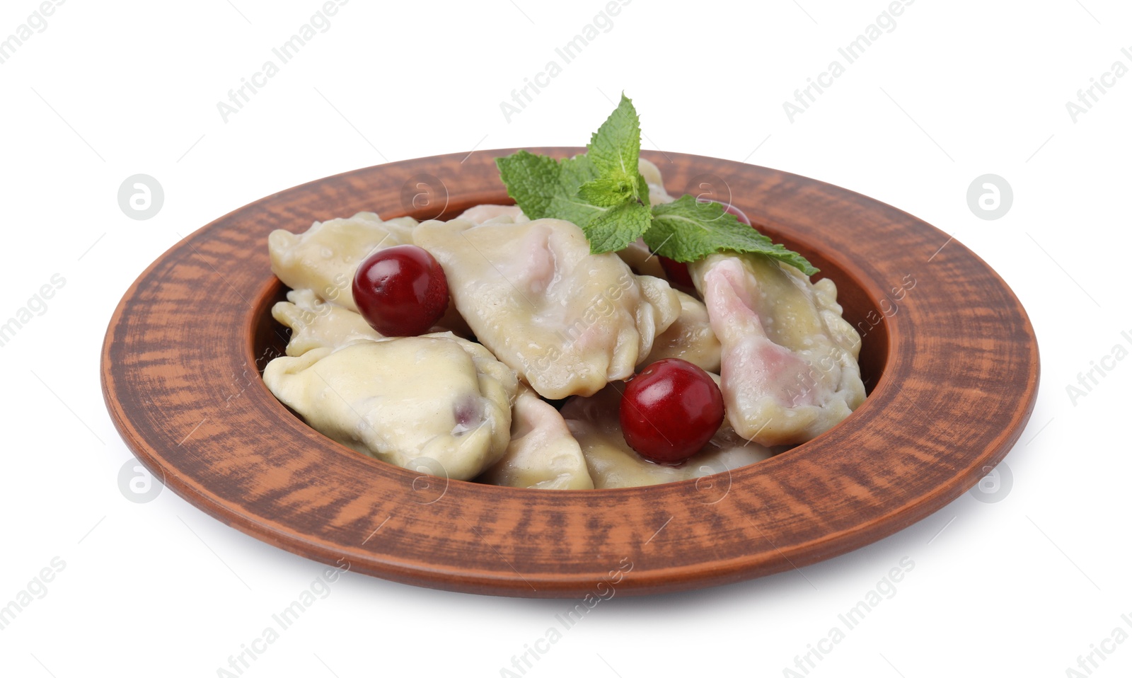 Photo of Traditional Ukrainian dumplings (varenyky) with cherries isolated on white