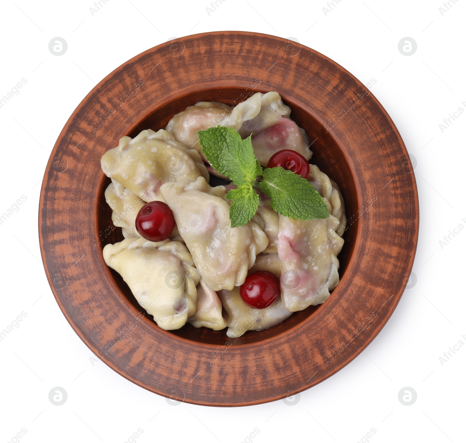 Photo of Traditional Ukrainian dumplings (varenyky) with cherries isolated on white, top view