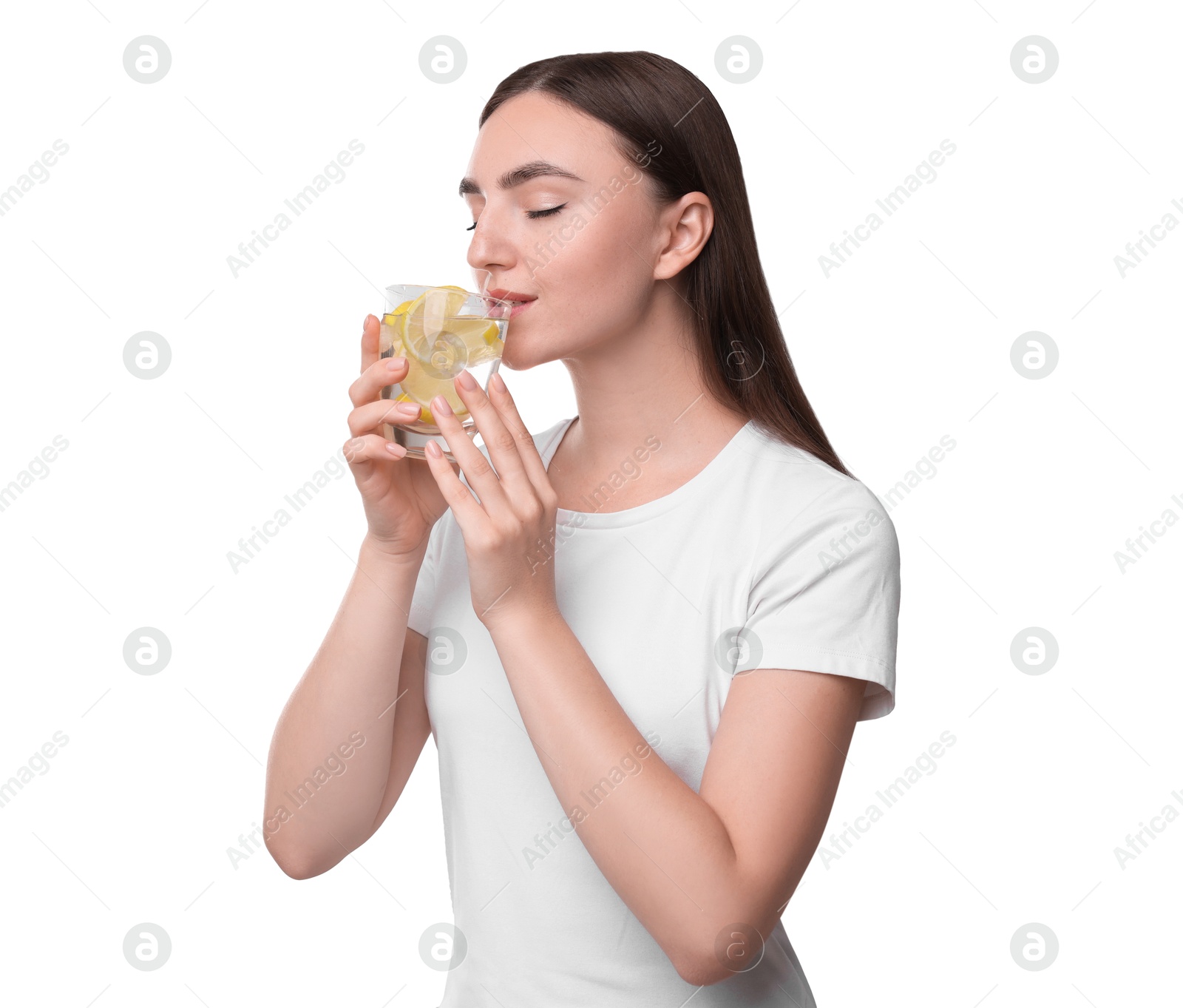 Photo of Woman drinking water with lemon on white background