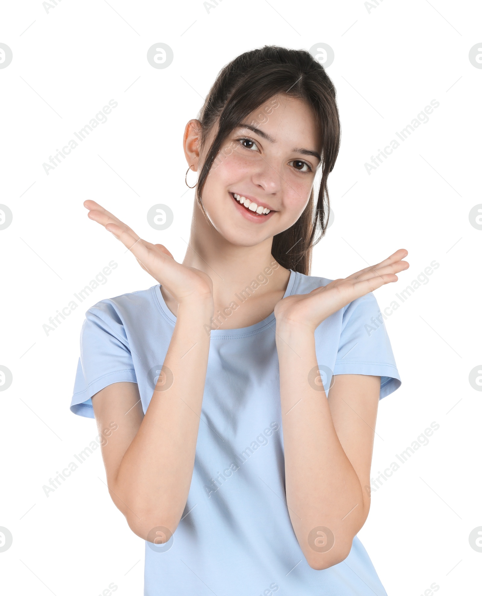 Photo of Portrait of smiling teenage girl on white background