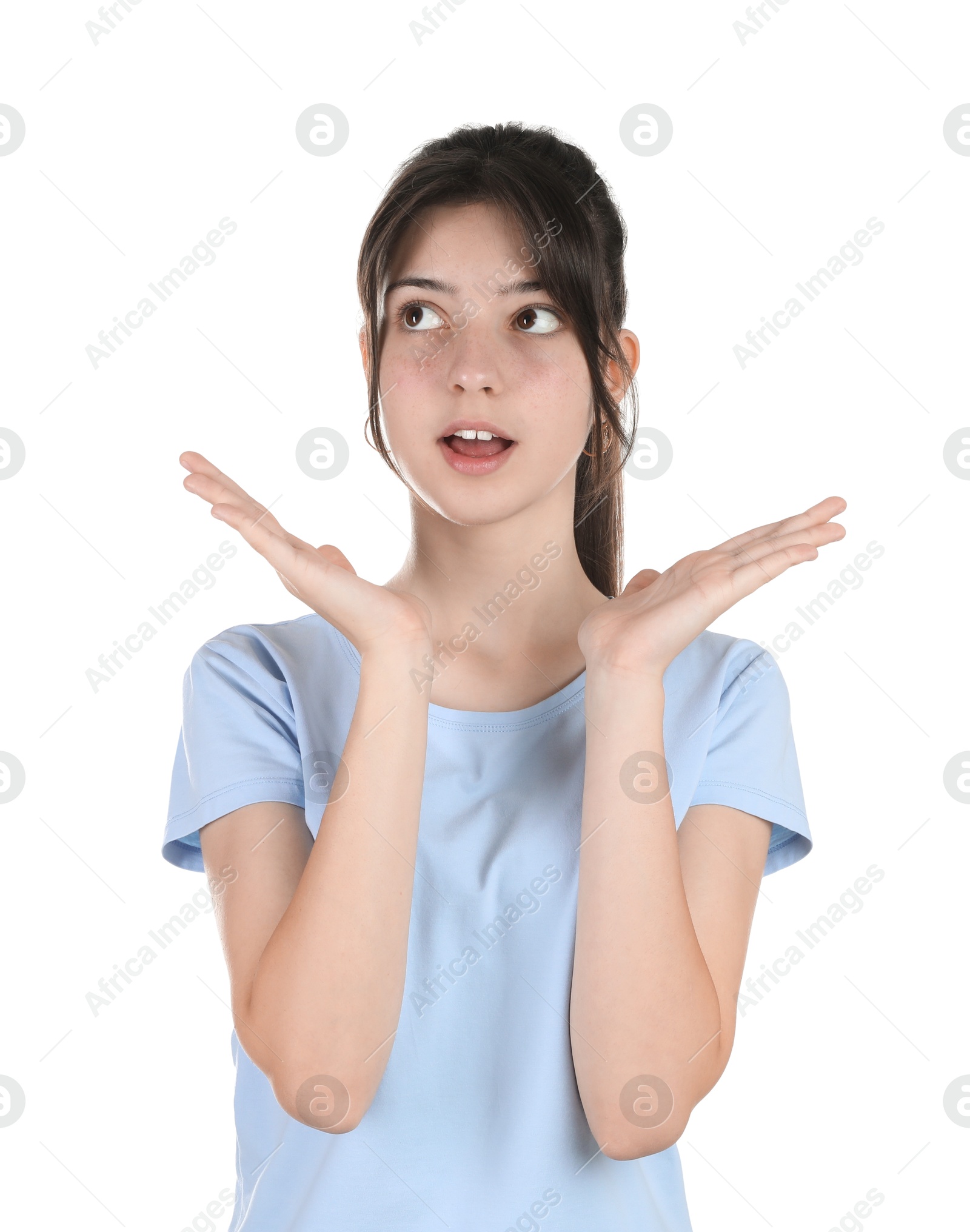 Photo of Portrait of surprised teenage girl on white background