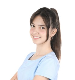 Photo of Portrait of smiling teenage girl on white background