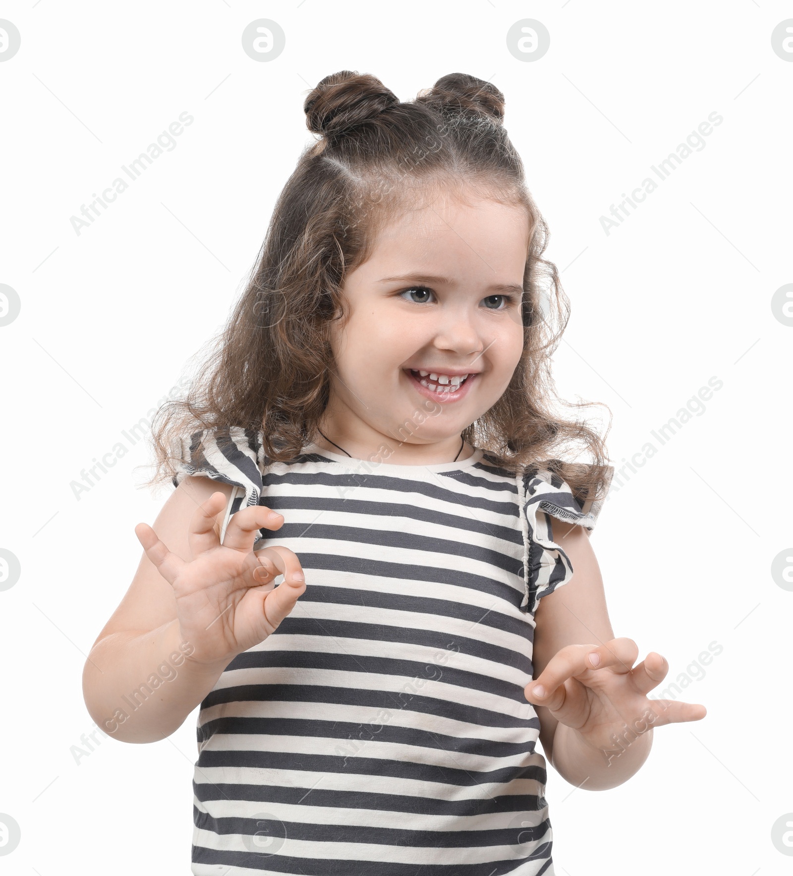 Photo of Portrait of smiling girl on white background. Adorable child