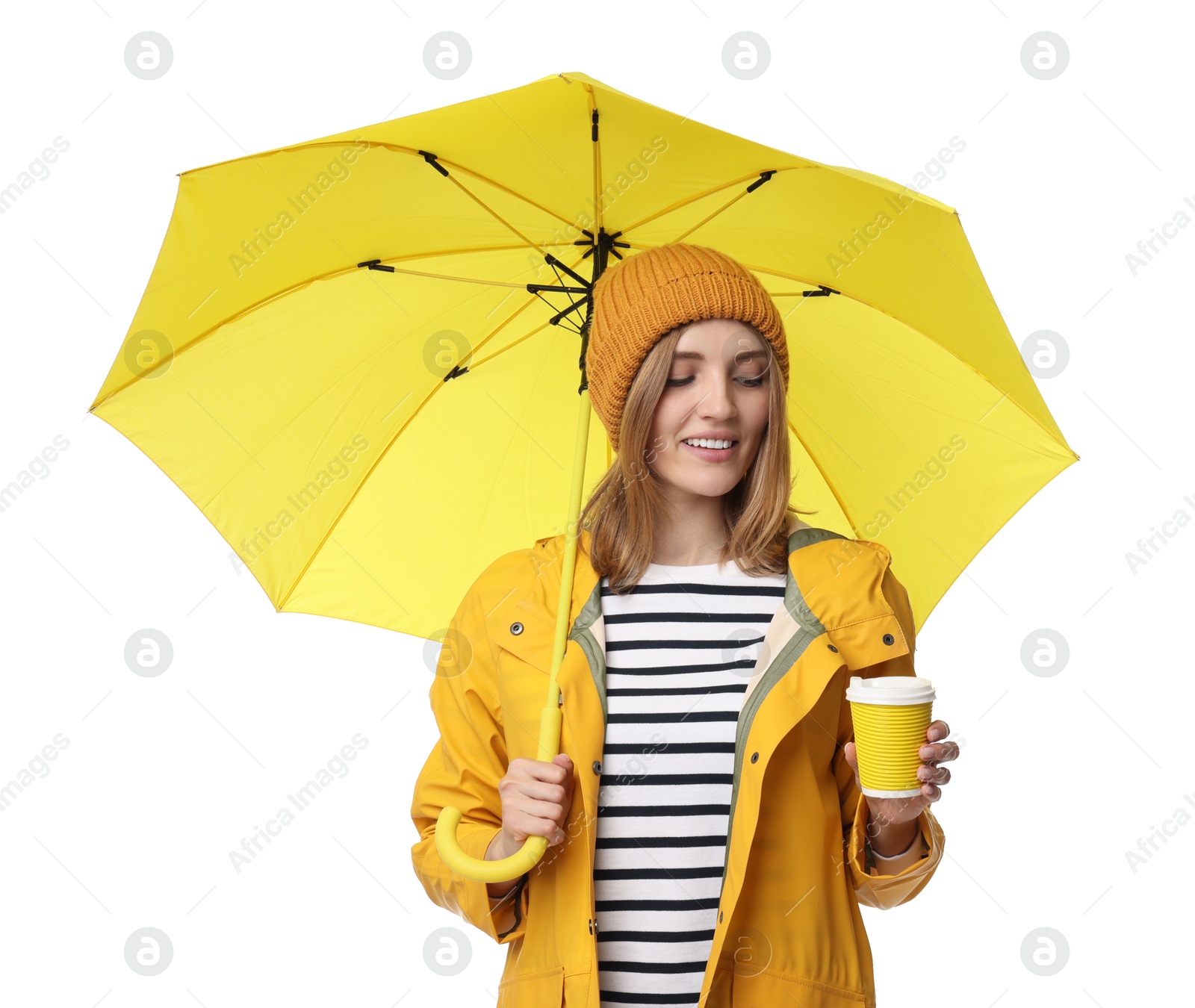 Photo of Woman with yellow umbrella and paper cup on white background