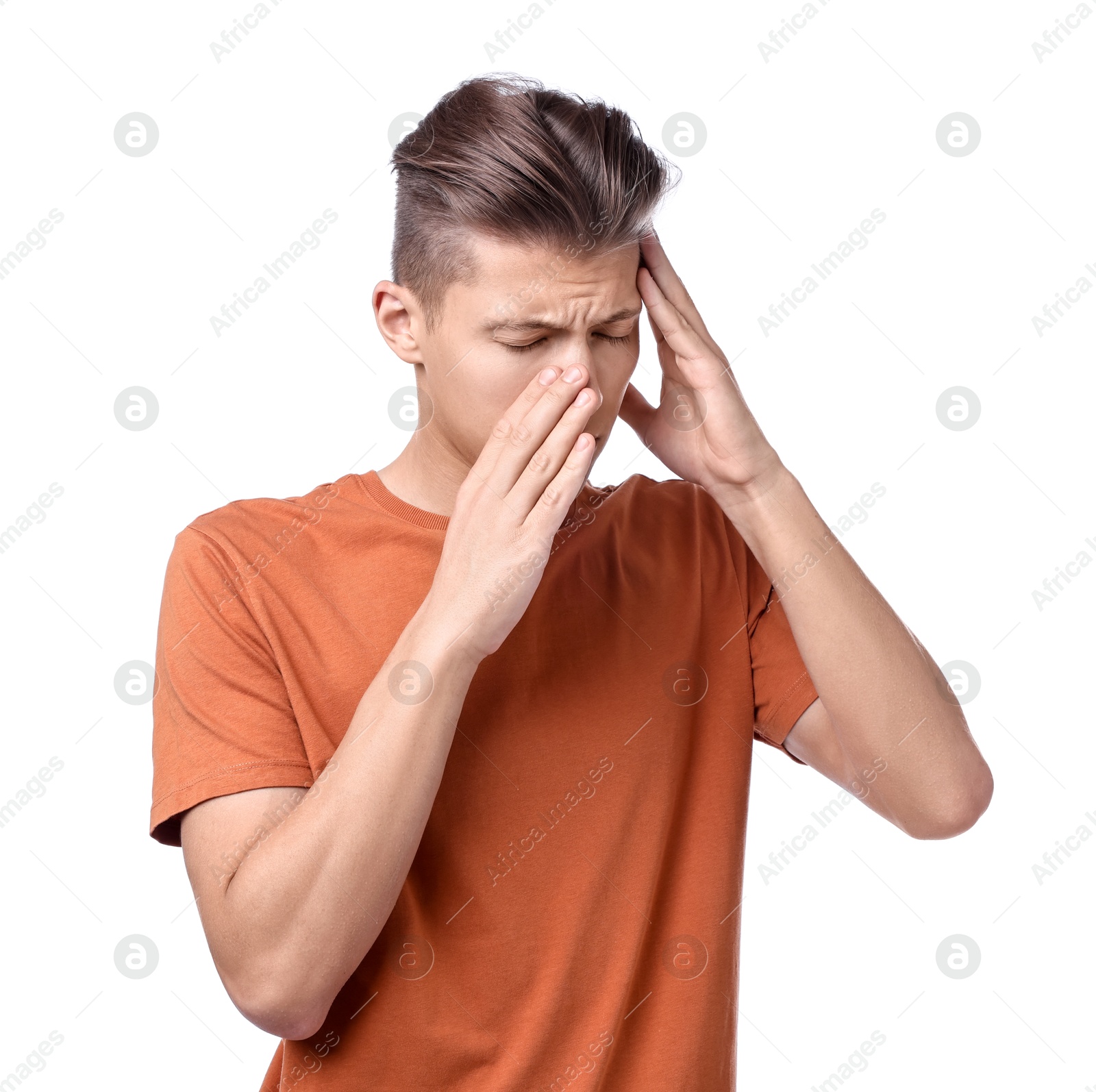 Photo of Young man suffering from sinusitis on white background